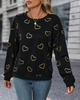 Einfacher Pullover mit Herzmuster